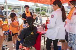 People attending COVID-19 vaccination event