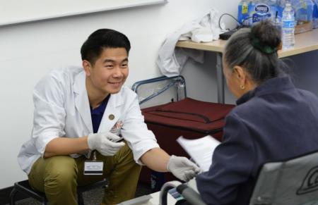 Pharmacist interacting with a patient